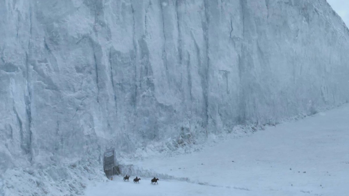 Horsemen ride out from under a wall of ice in "Game of Thrones" 