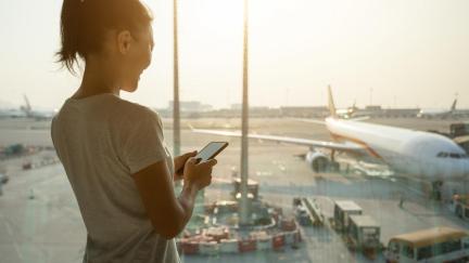 GigSky Airport Woman With A Phone