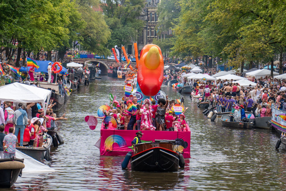 In Amsterdam, Pride Parade floats travel through historic canals