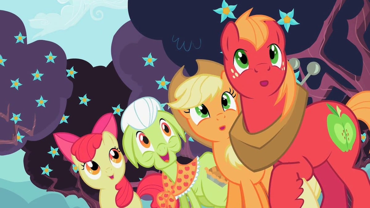 Four My Little Ponies in Applejack's family look out with wonder