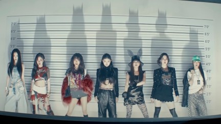 Badvillain pose in a line-up in a shot from their music video.