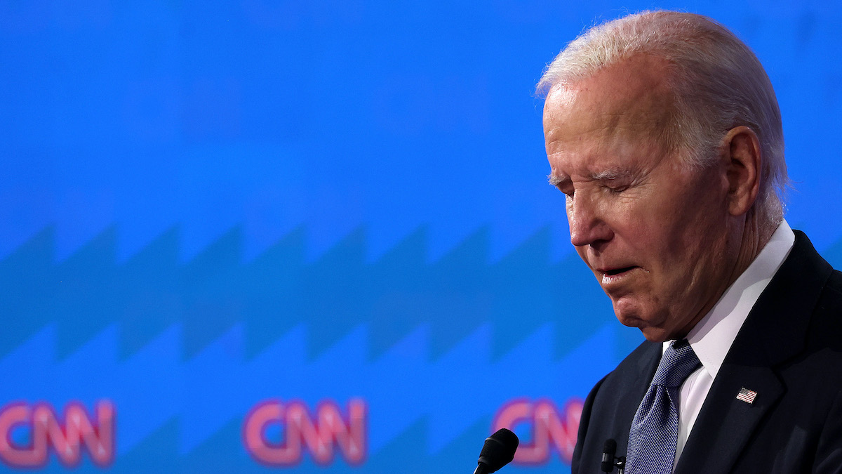 Joe Biden looks disoriented during a debate.