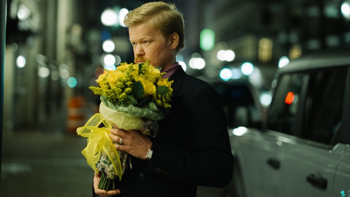 jesse plemmons holding flowers