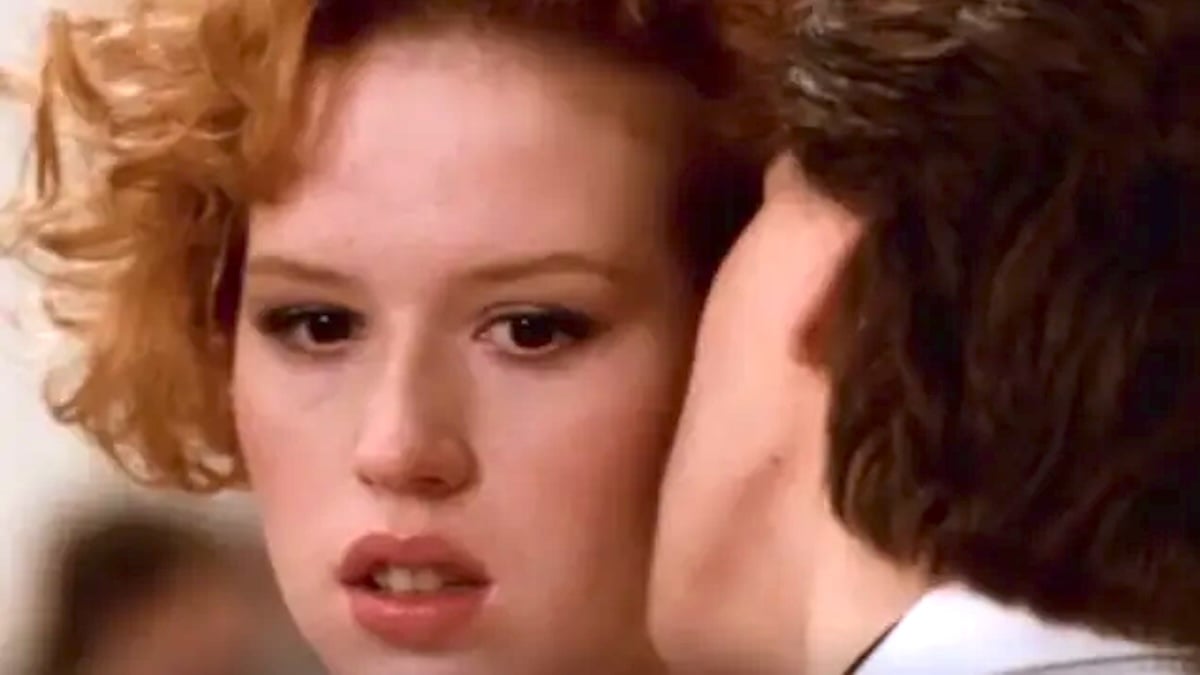 Blane whispers in Andie's ear in Pretty in Pink.