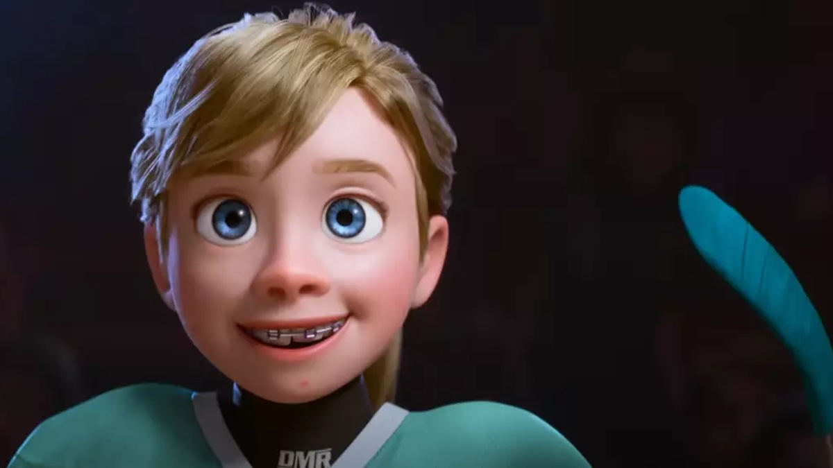 riley holding a hockey stick in inside out 2