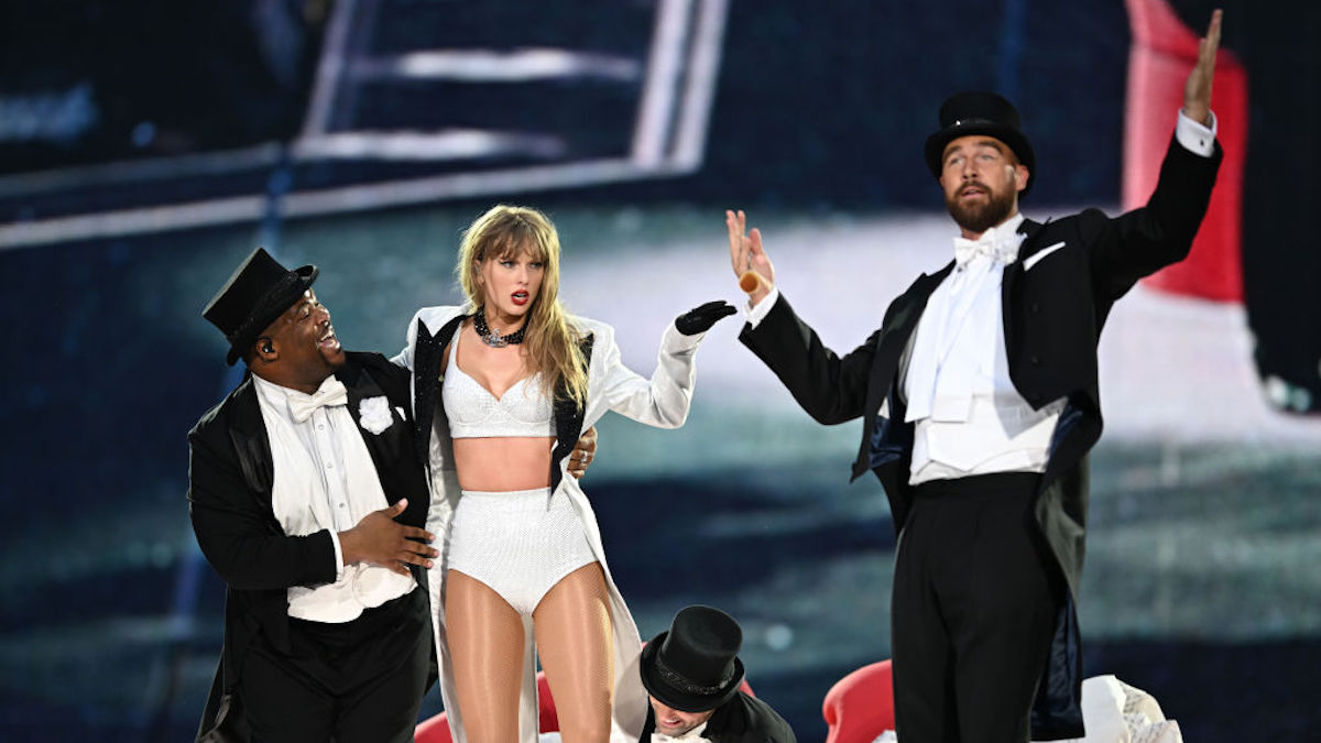 Taylor Swift is joined on stage by Travis Kelce during a performance of the Eras Tour