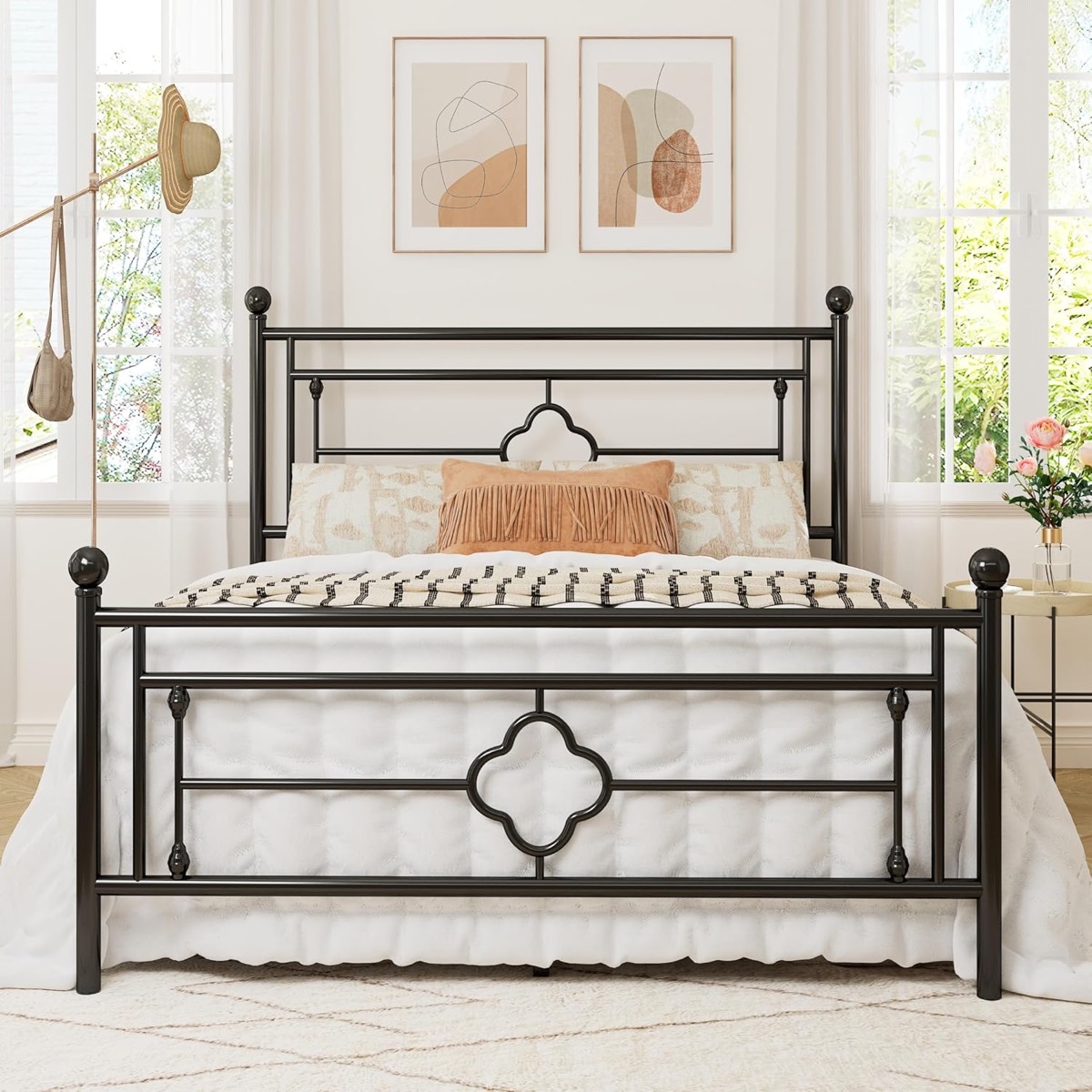 A bed with metal bed frame from "Allewie" 