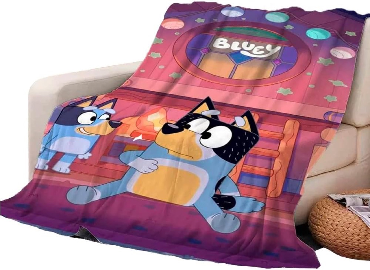 Bluey blanket featuring Bluey and Bandit