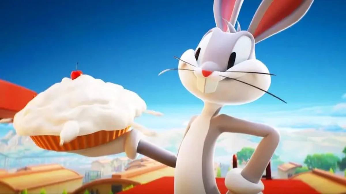 Bugs Bunny smirks holding a pie 