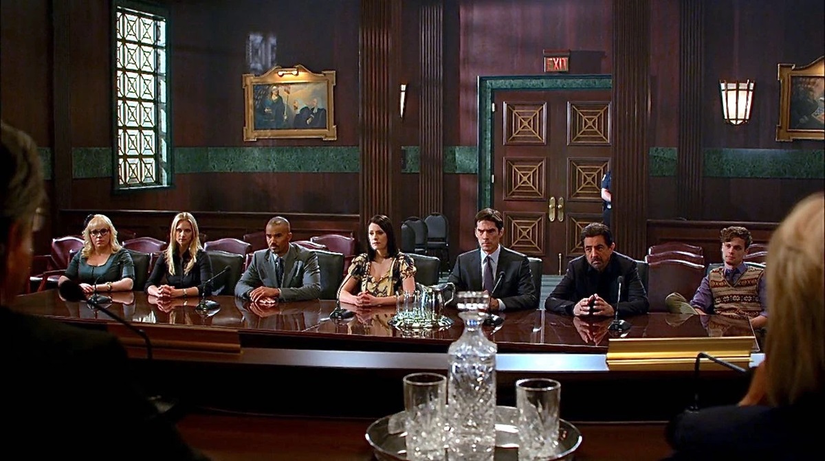 The BAU squad assembled in a court room