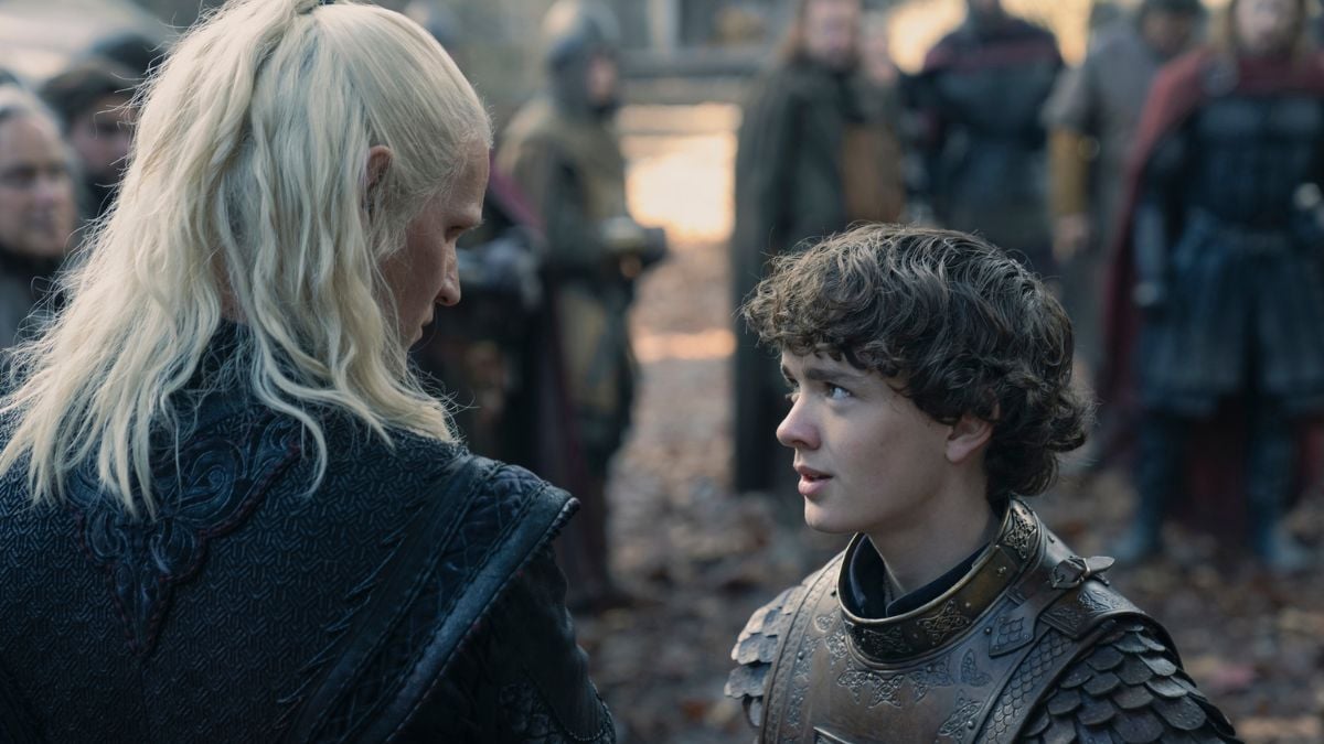 Matt Smith as Daemon Targaryen and Archie Barnes as Oscar Tully look at each other in House of The Dragon season 2 episode 7 "The Red Sowing"