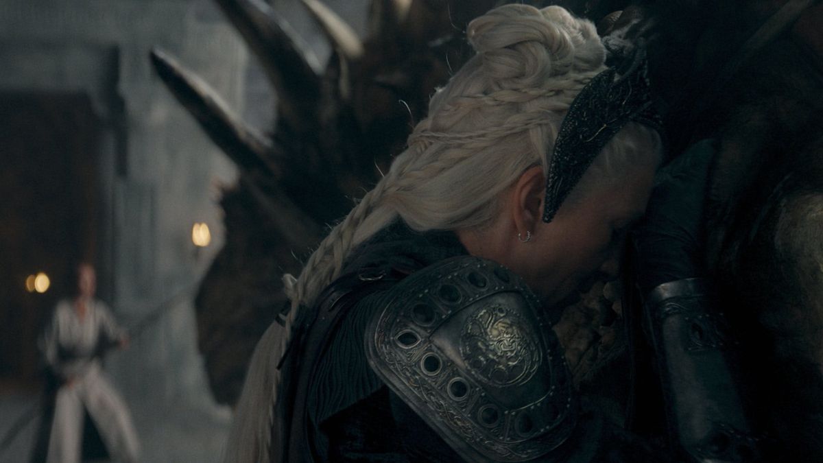 Eve Best as Rhaenys Targaryen hugs her dragon Meleys in House of The Dragon season 2