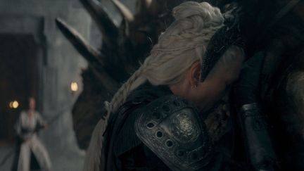 Eve Best as Rhaenys Targaryen hugs her dragon Meleys in House of The Dragon season 2