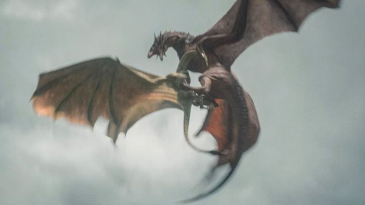 The dragons Sunfyre and Meleys engaged in battle in the sky in House of the Dragon