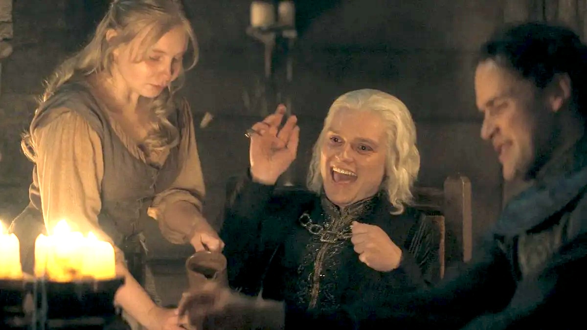 Aegon is served a drink by a terrified Dyana