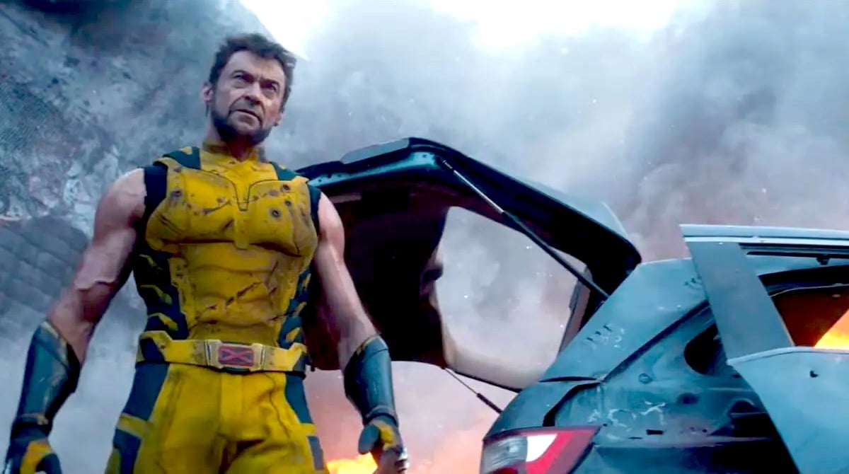 Hugh Jackman wearing Wolverine's signature yellow and blue suit