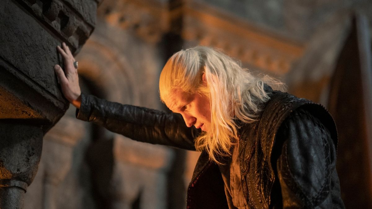 Matt Smith as Daemon Targaryen stands above a fireplace at Harrenhal in House of the Dragon