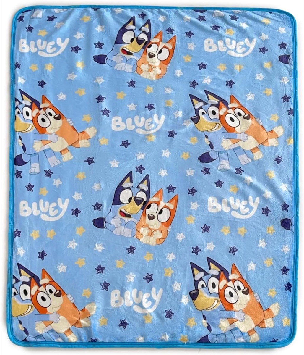 A blanket showing Bluey and Bingo