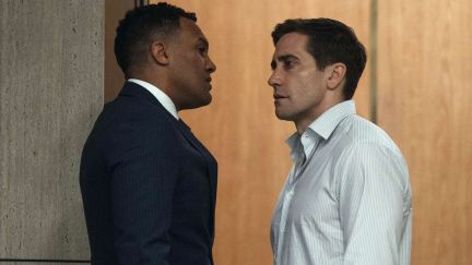 O-T Fagbenle as Nico Della Guardia and Jake Gyllenhaal as Rusty Sabich stand face to face in Presumed Innocent