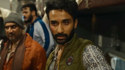 Raghav Juyal as Fani stands with his gang members in the train in Kill movie