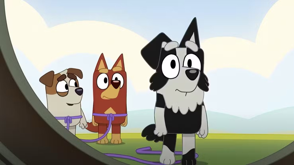 Three animated dog children stare into a tunnel fearfully 