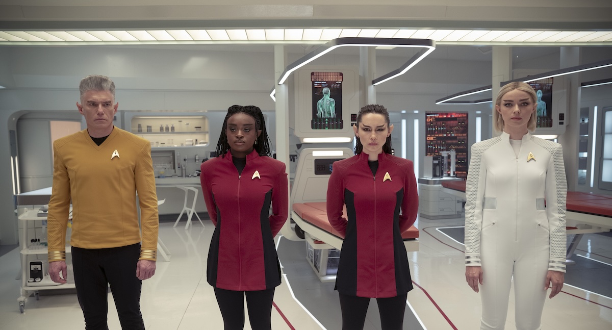 Star Trek: Strange New Worlds Season 3 actors Anson Mount as Pike, Celia Rose Gooding as Uhura, Christina Chong as La’an and Jess Bush as Chapel, all with hot vulcan ears and "yak hair" eyebrows