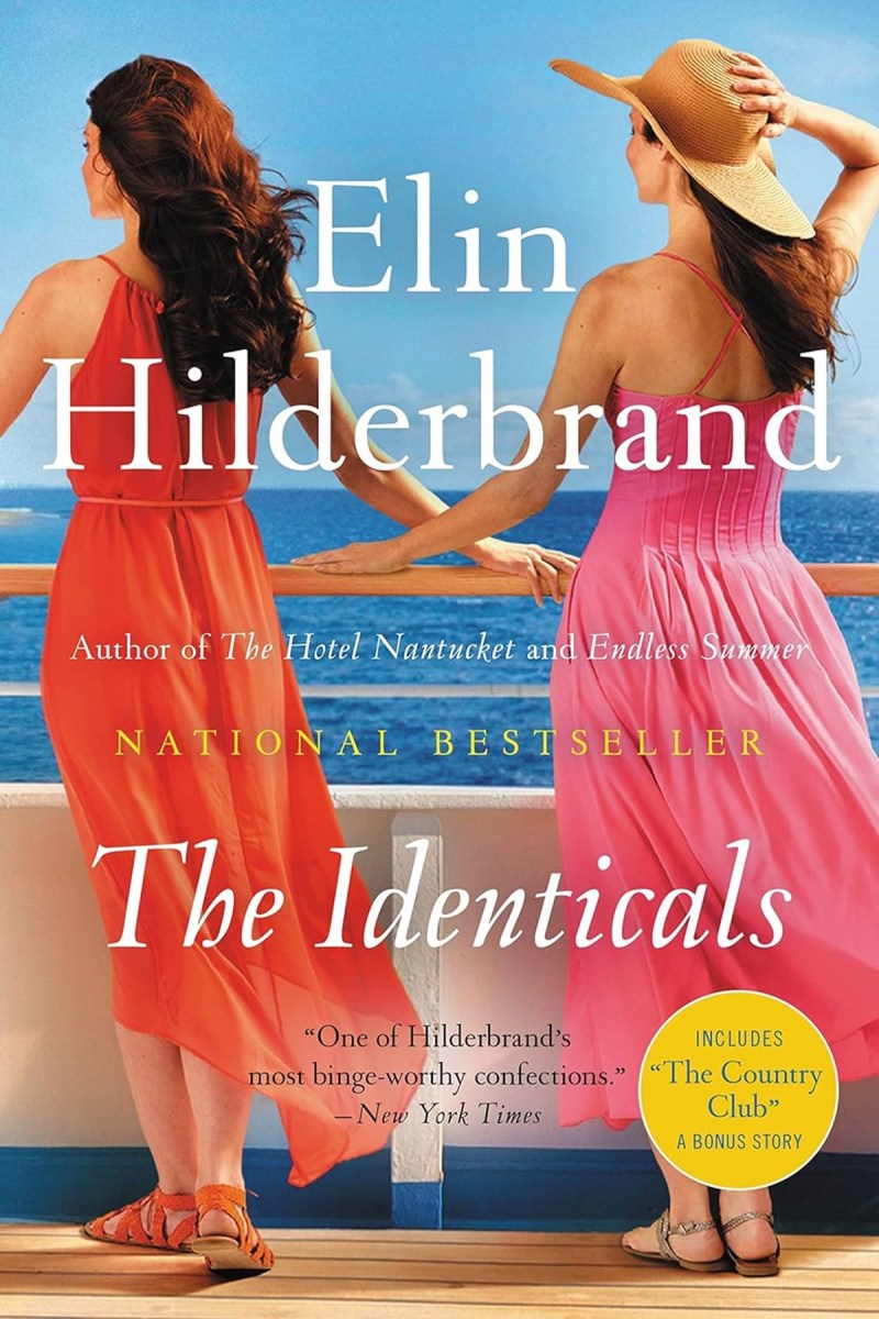 The Identicals cover: two women in sundresses look out onto the sea