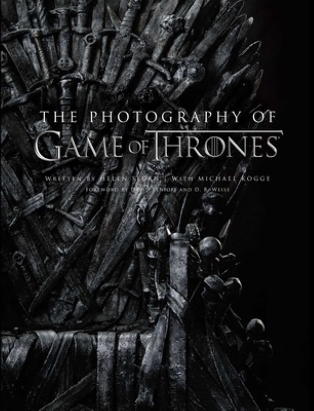 A black and white photograph of the Iron Throne with The Photography of Game of Thrones, the Official Photo Book of Season 1 to Season 8 in white text over it