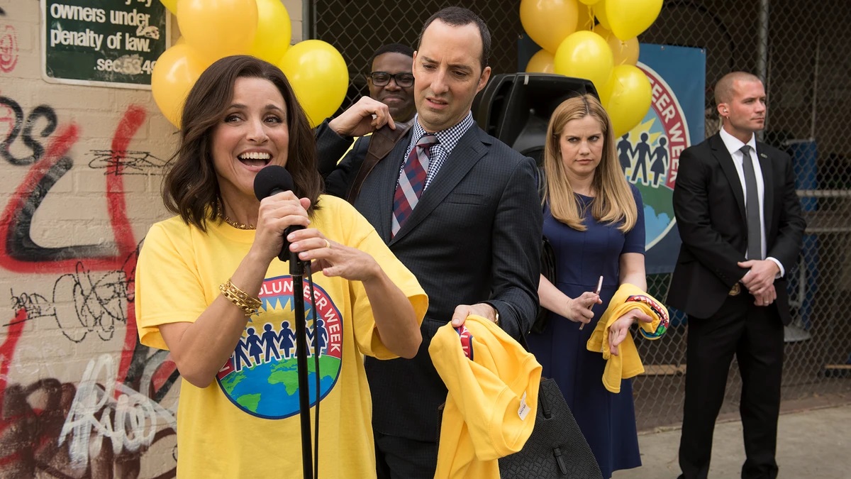 Selina wears a yellow shirt while Gary and Amy scowl