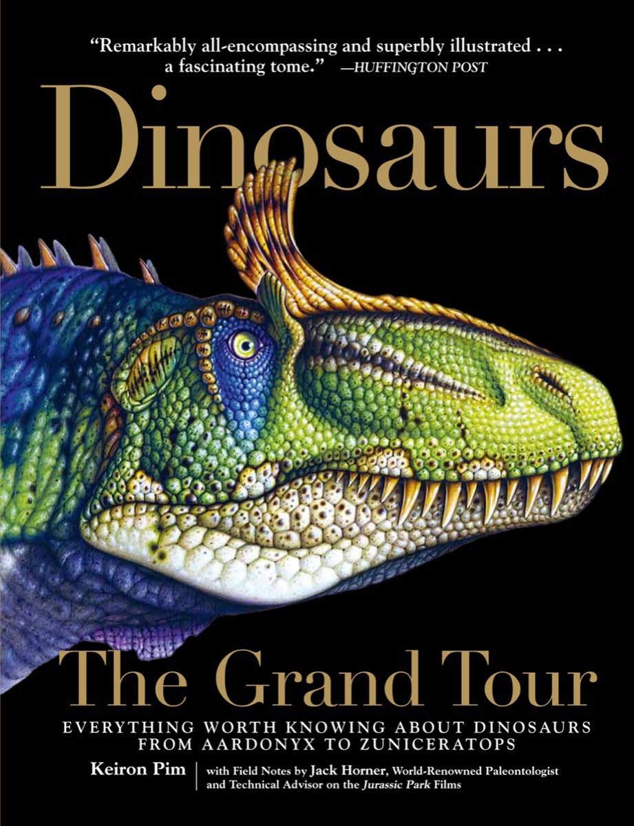 Cover of Dinosaurs - The Grand Tour: Everything Worth Knowing About Dinosaurs from Aardonyx to Zuniceratops. A green and blue jewel tones lizard with hug teeth looks to the right under the title which is in tan over a black background.