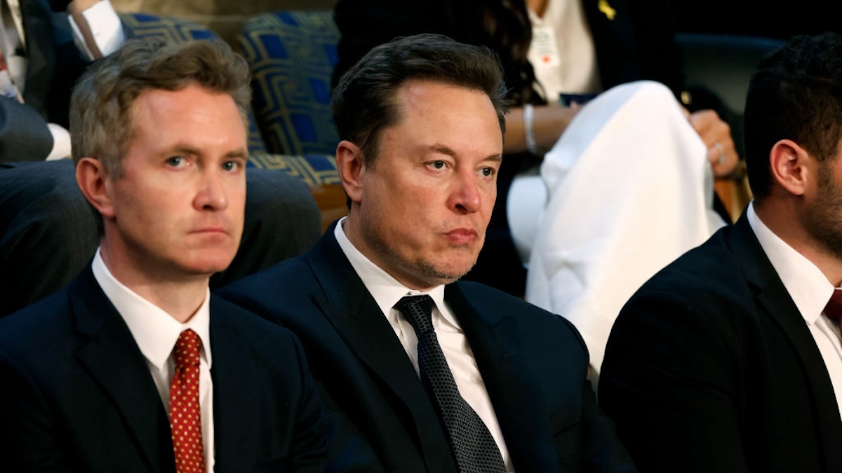 Famed butthead Elon Musk looking grumpy.