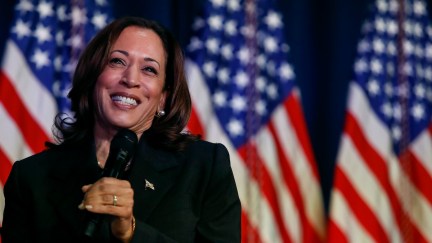 kamala harris with a mic