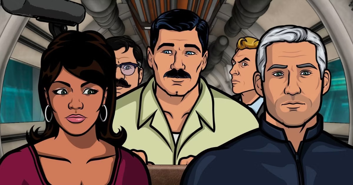 Archer sports a mustache while talking to his coworkers in "Archer" 