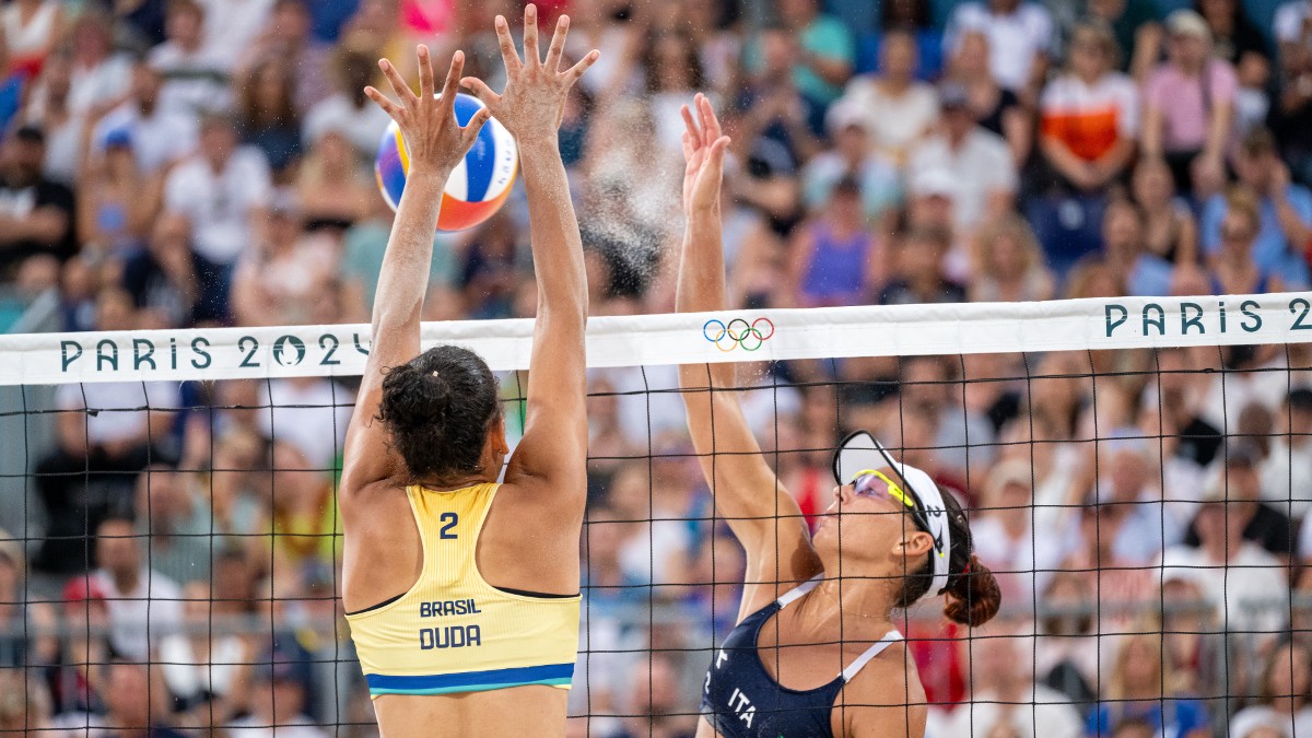 Eduarda Santos Lisboa and Marta Menegatti compete in a women's beach volleyball match during the 2024 Olympics