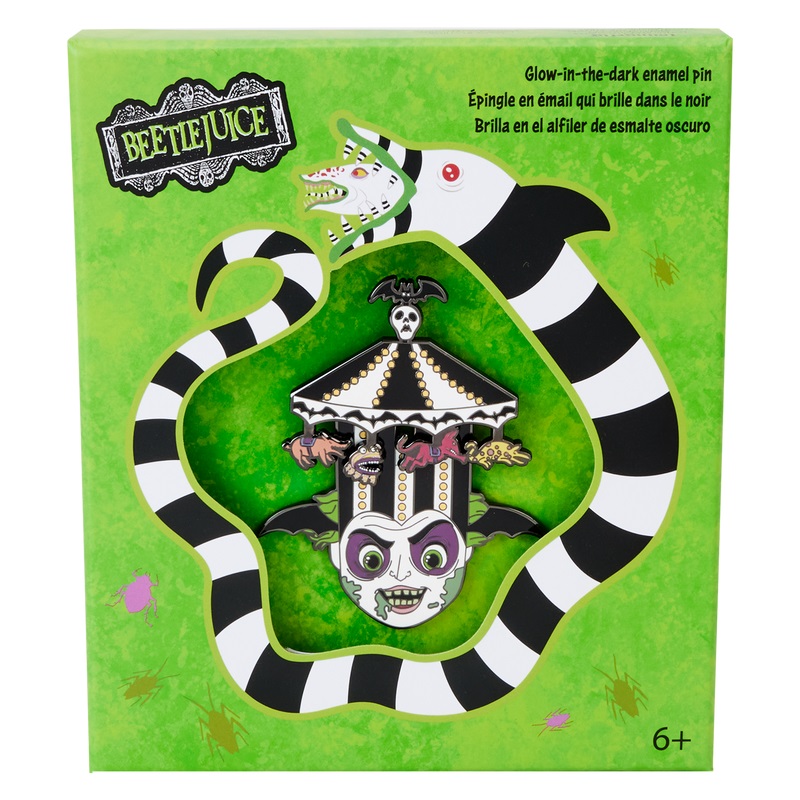 An enamel pin of Beetlejuice wearing his carousel hat in a collector box. 