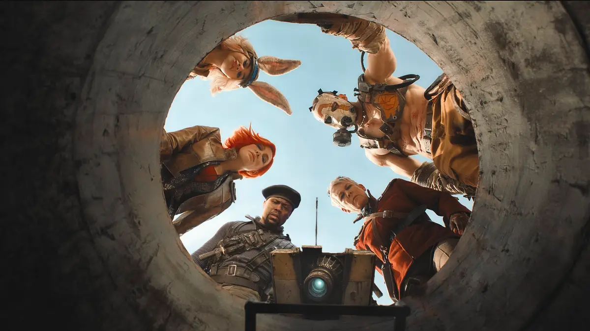 Cate Blanchett, Kevin Hart, Jamie Lee Curtis, Ariana Greenblatt, and Florian Munteanu look down an underground tunnel in a scene from Borderlands