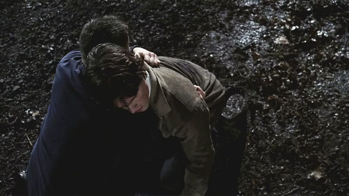 Jensen Ackles as Dean hugs Jared Padalecki as Sam Winchester in Supernatural season 2