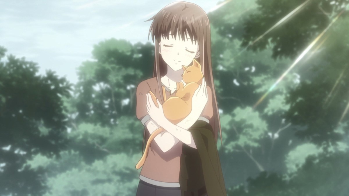 Tohru Honda holding Yuki Sohma in his cat form