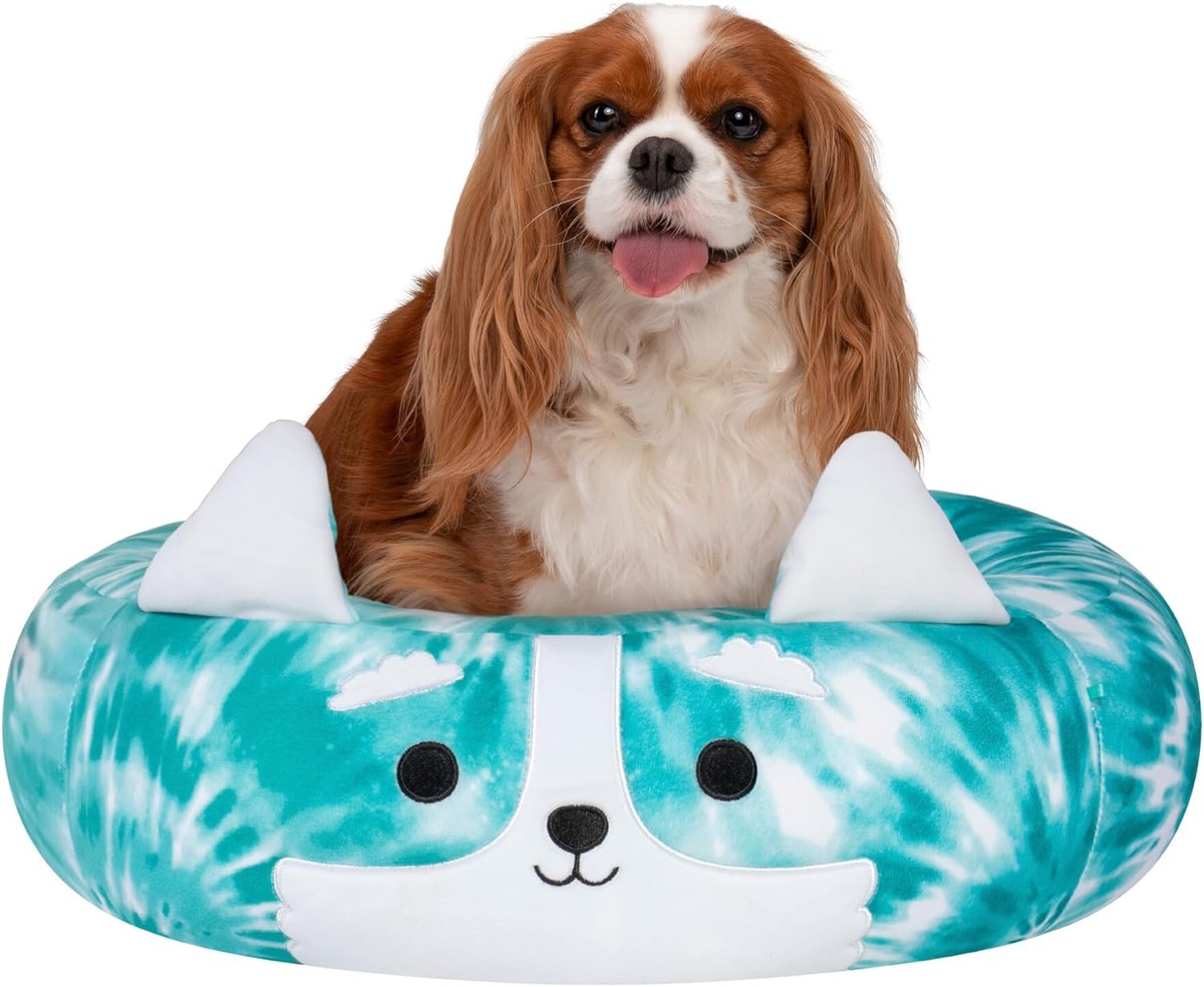 A dog sits in a Halver The Corgi Pet Bed