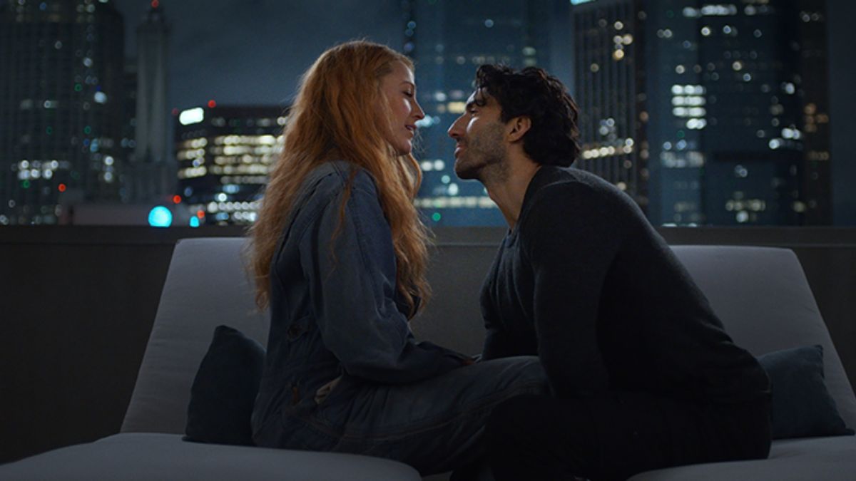 Blake Lively as Lily Bloom and Justin Baldoni as Ryle Kincaid look into each other's eyes in a scene from It Ends With Us