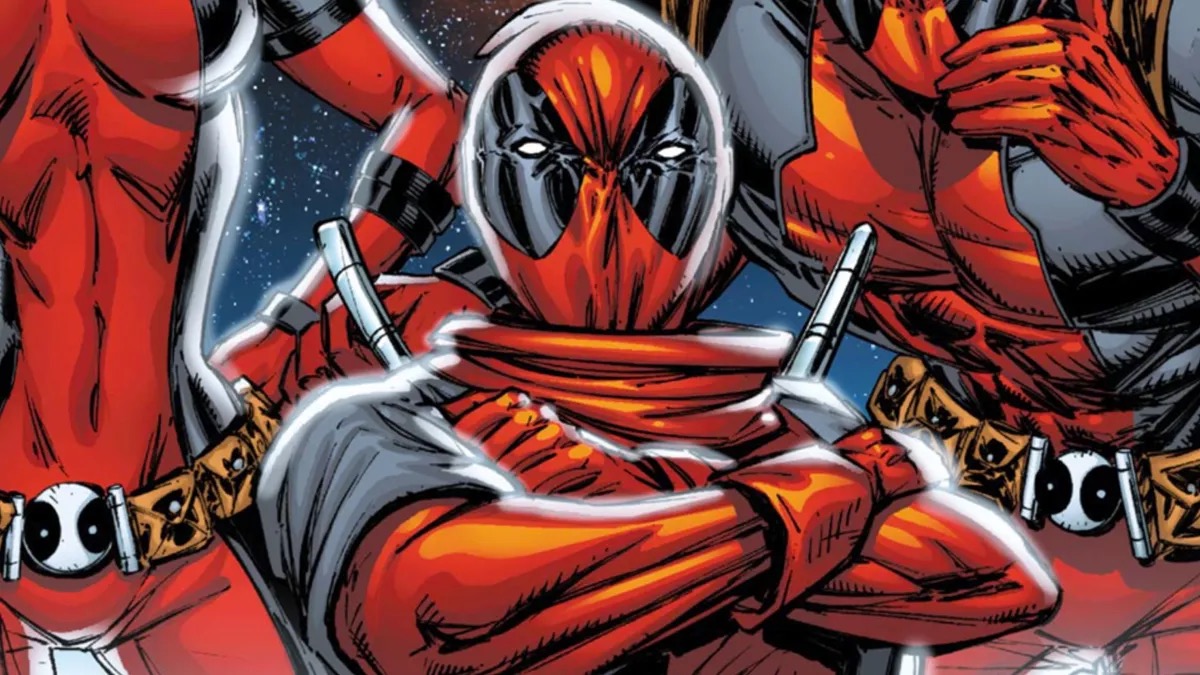 A child Deadpool stands with his arms folded 