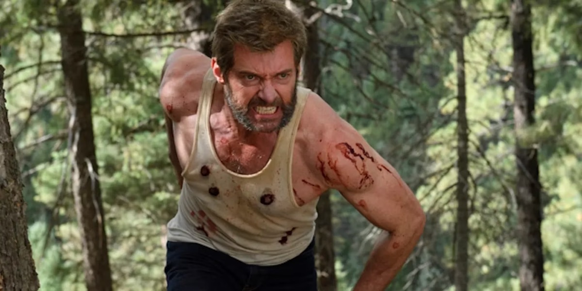 A bloody Wolverine runs towards a foe in "Wolverine" 