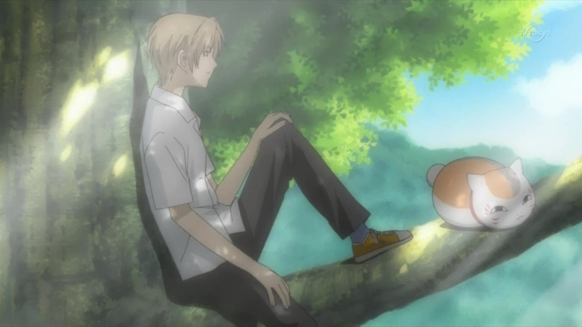 Takashi Natsume and Madara relaxing on a tree branch