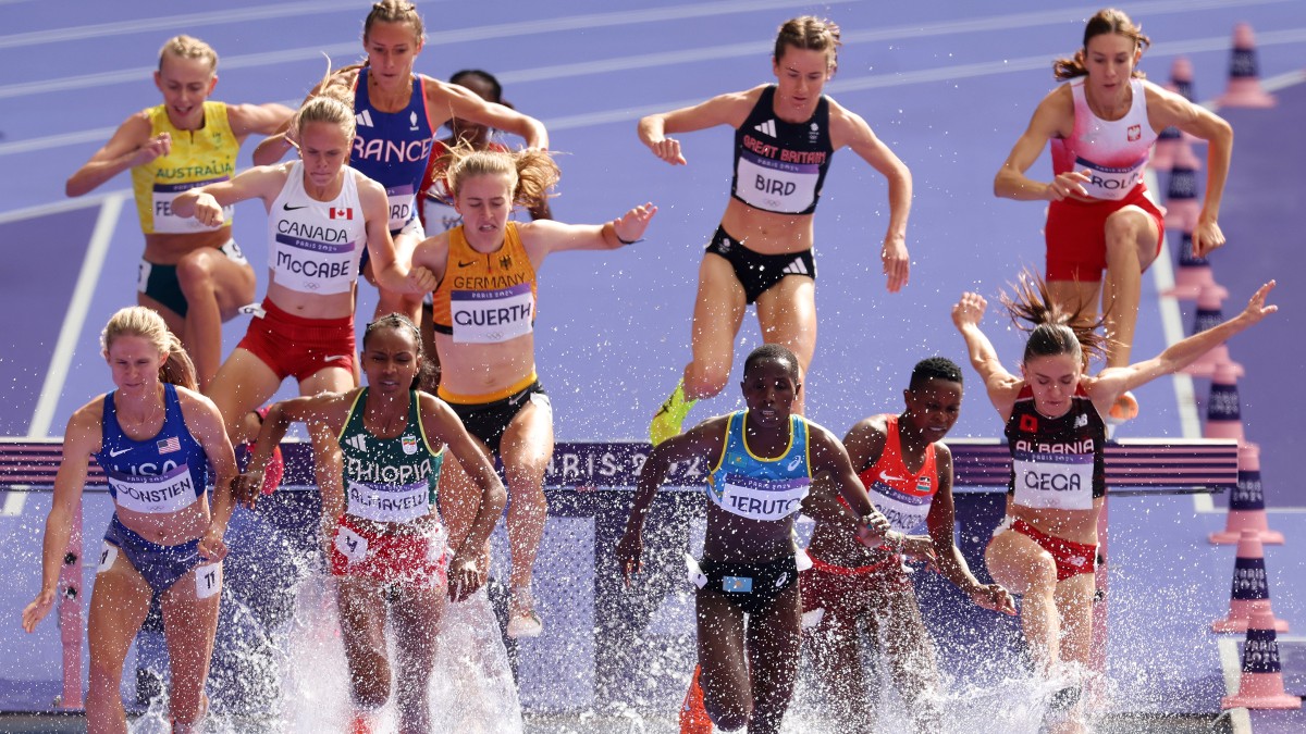 Track and field athletes participate in the Women's 3000m Steeplechase at the 2024 Olympics