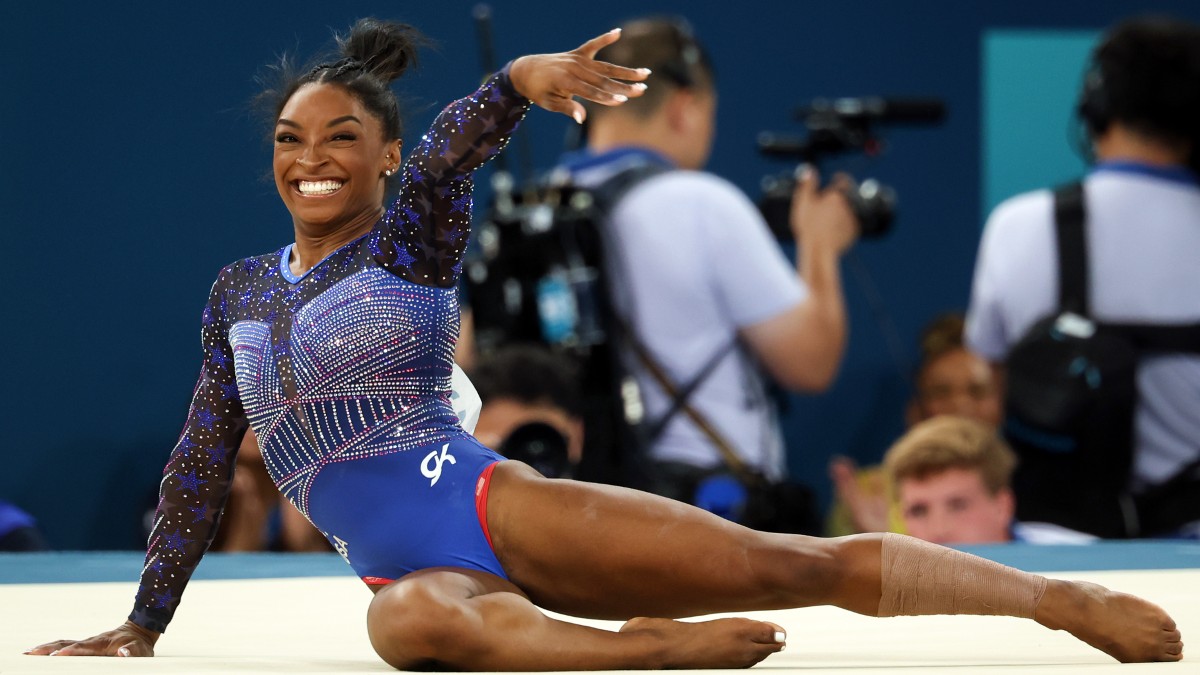 Simone Biles competing in the floor exercise during the 2024 Olympics