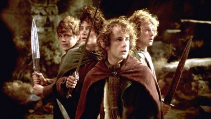 Pippin, Merry, Frodo, and Sam fighting against the Witch King of Angmar in The Lord of the Rings: The Fellowship of the Ring