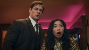 Noel (John Cena) and Katie (Awkwafina) look surprised in a still from Amazon's 'Jackpot!'