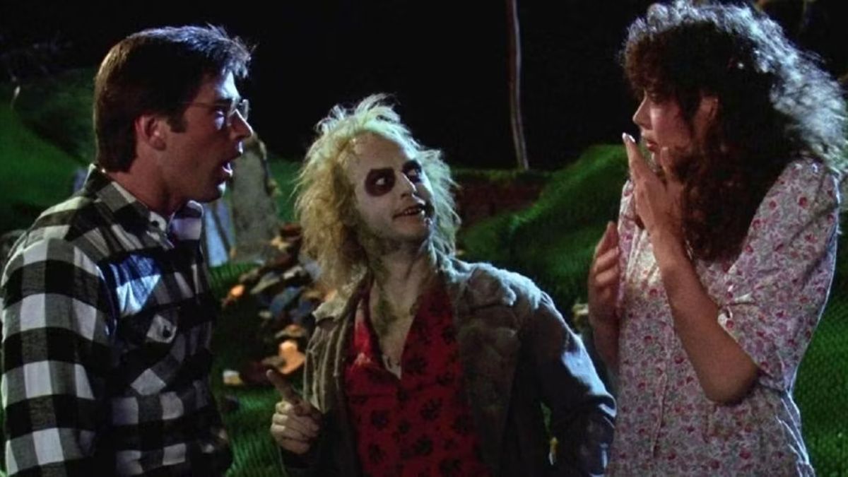 Barbara (Geena Davis) and Adam (Alec Baldwin) speak to Beetlejuice (Michael Keaton) in 1988's 'Beetlejuice'