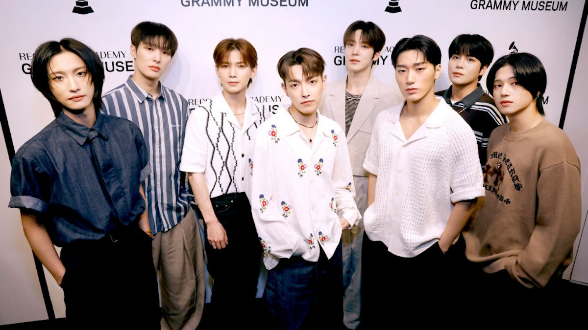 ATEEZ members posing for a photo.