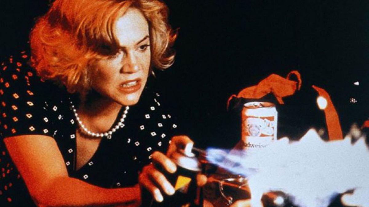 Kathleen Turner's Beverly Sutphin creating a makeshift flamethrower in Serial Mom.